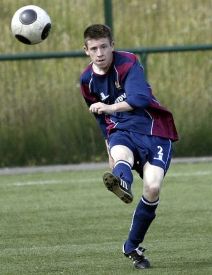 Clearing the soccer ball with a long kick