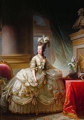 Marie Antoinette standing in dress