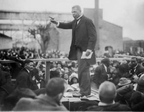 Booker T. making a speech to a crowd
