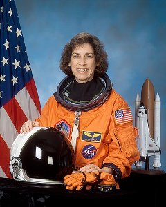 Portrait of Ellen Ochoa in spacesuit