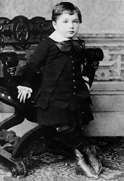 Albert Einstein at age 3 standing