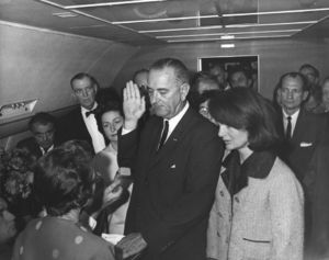 Lyndon Johnson getting sworn in on Air Force One