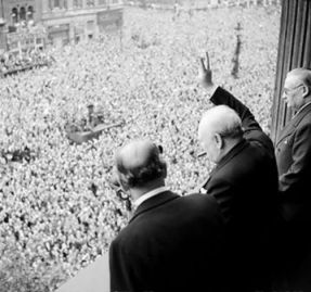 Churchill waving to crowd after victory