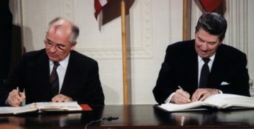 Reagan and Gorbachev signing INF Treaty
