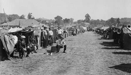 Man sitting on crate in Bonus Army camp