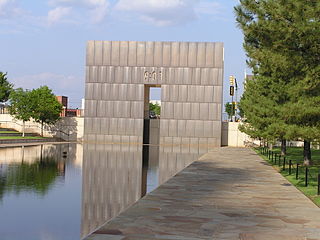 Photo of memorial with time showing