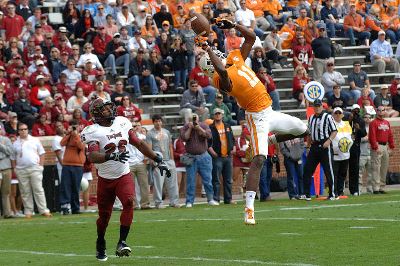 Player jumping to catch the ball