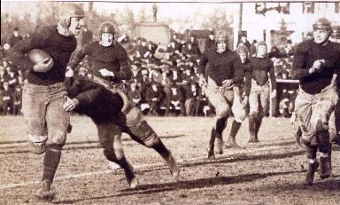 Football player running with ball