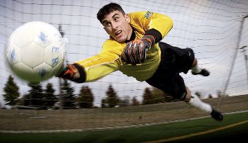 Keeper saving a shot on goal