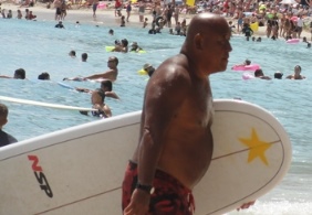 Man walking with surf board